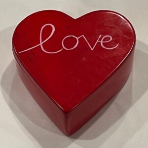 Red heart-shaped soapstone box with love design